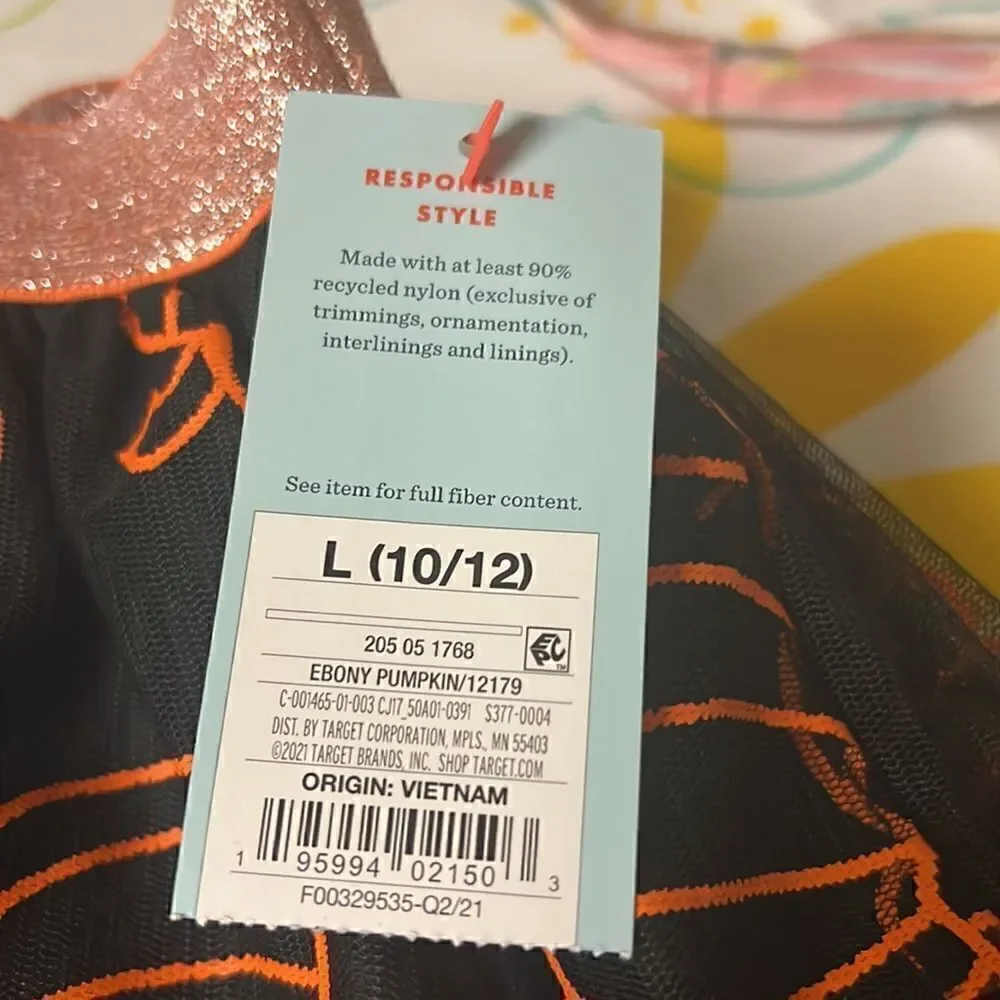 Black tutu orange pumpkins adorn this adorable fall Cat & Jack skirt